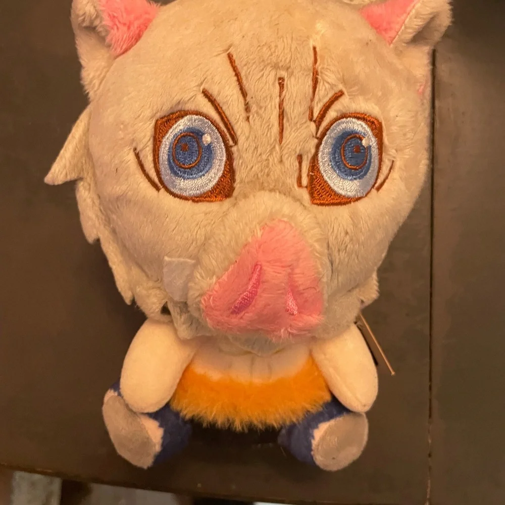 Gray and Pink Plush Toy with Blue Eyes